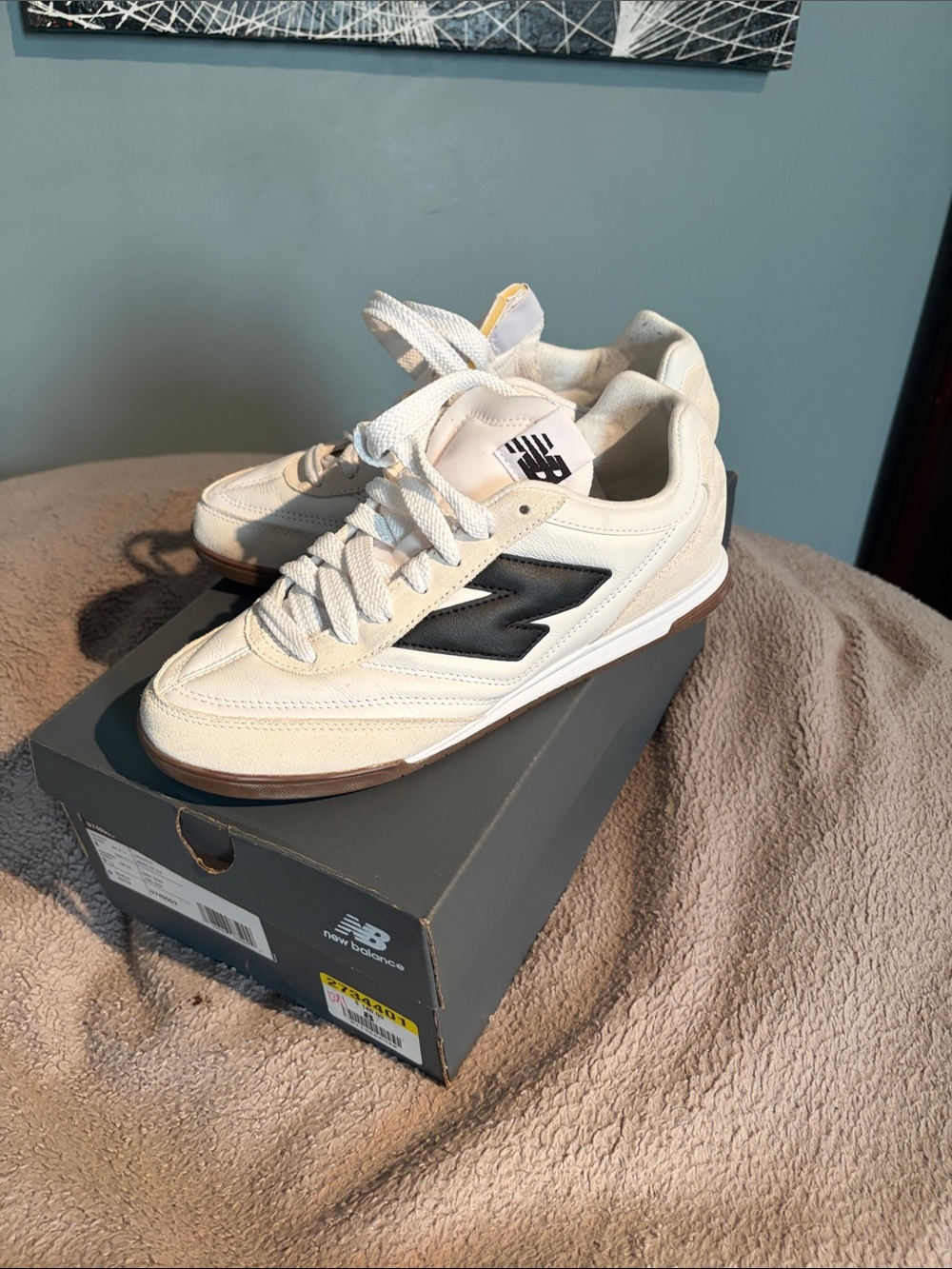 New Balance Cream Sneakers with Black Logo